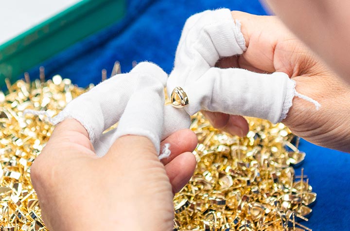 worker working on gold plating finish